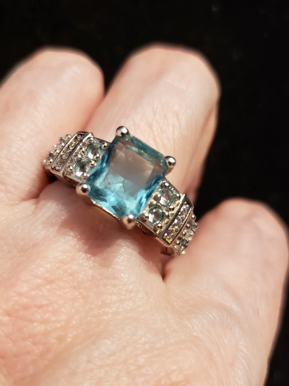 NEW Sterling Stamped S925 emerald-cut Aquamarine, Size 10 Flanked W/smaller Aqua